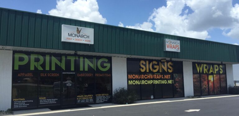 Monarch Direct storefront featuring exterior business signs in Port Charlotte FL