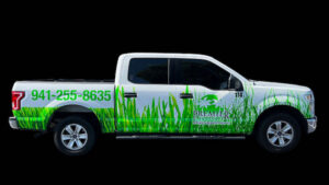 A truck with a custom wrap designed by our print shop in Port Charlotte Florida